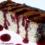 Blueberry cake slice with spiced apple juice