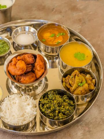 Maharashtrian Thali, Maharashtrian Food, Maharashtrian Cuisine, Prawn Koliwada, Varan, Thali, Kosimbir, Egg Rassa, Basundi, Dudhi ki sabzi