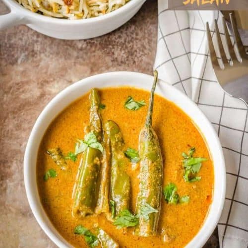 Bowl of green chilies curry. It is a tangy curry with peanut sesame base and a popular side dish from Hyderabad cuisine