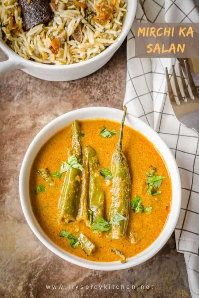 Bowl of green chilies curry.  It is a tangy curry with peanut sesame base and a popular side dish from Hyderabad cuisine 