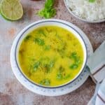 Bowl of moong dal with lime.